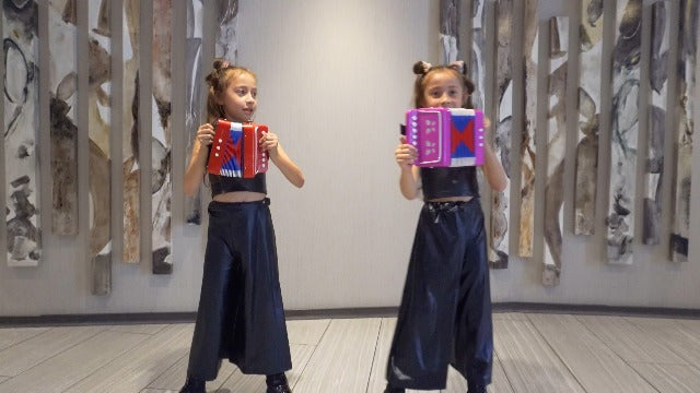 Kids Toy Accordion with 7 Vocal Keys. Portable Mini Musical Instrument with Easy to Carry Back Strap included. Ideal for Kids 3+ Red