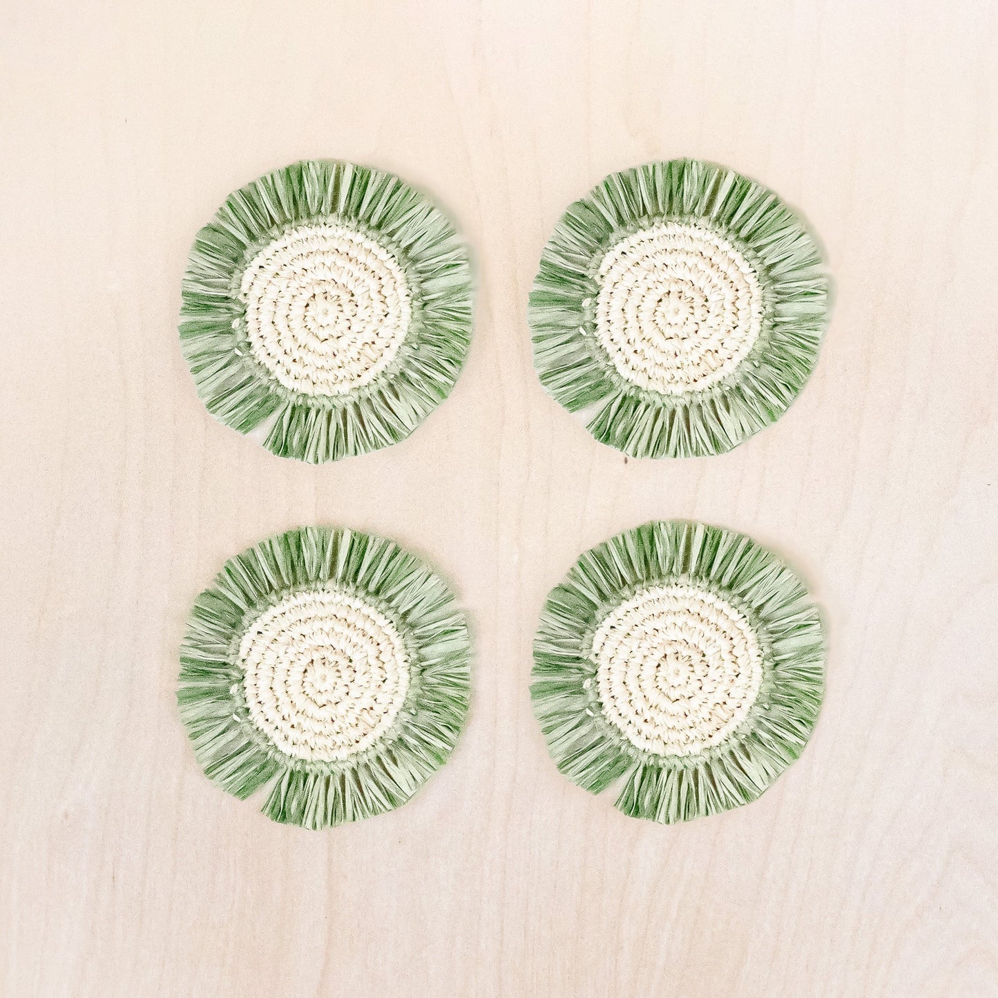 Sage Raffia Round Crochet Coasters with Fringe, set of 4 | LIKHA
